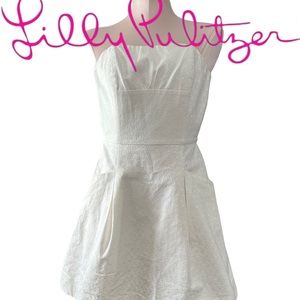 Lilly Pulitzer white strapless dress in size 0. Fully lined. Has pockets.
